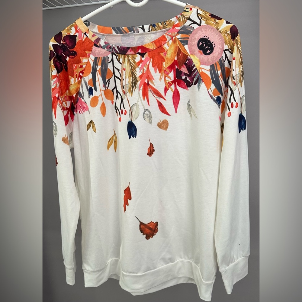 NO BRAND SHOWN size LARGE white with floral and leaves, long sleeved sweatshirt